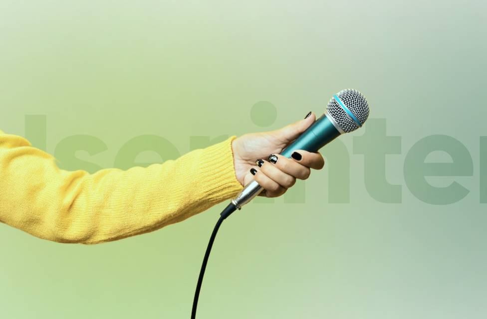 A person holding a microphone