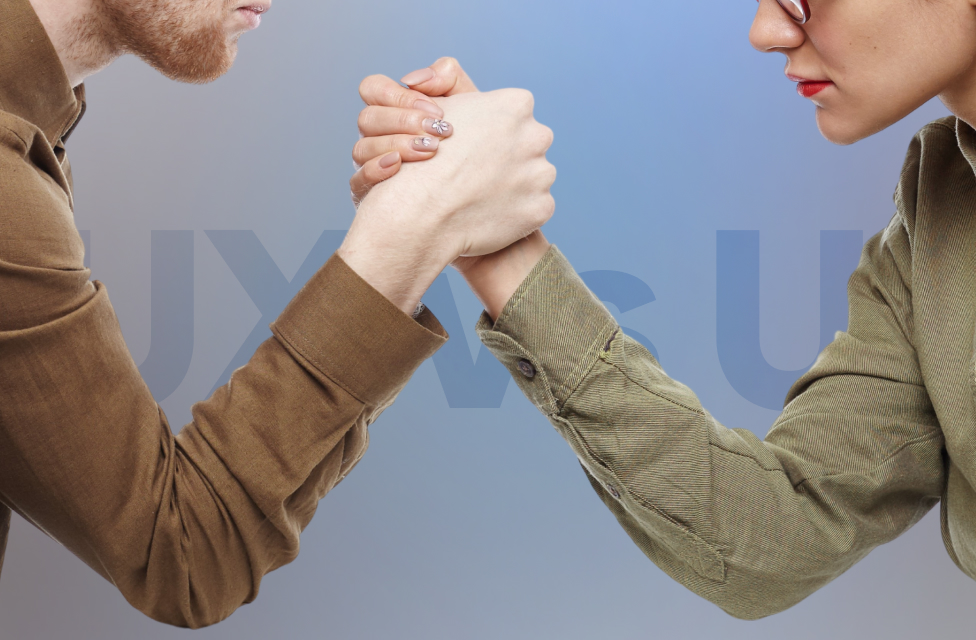 People arm wrestling