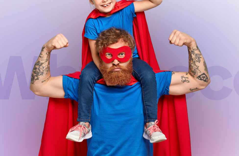 Dad and his son in a superhero suit